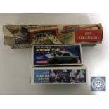 A vintage German tin plate Technofix bus terminal with original box and two other boxed toys