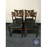 A set of four mid 20th century Danish teak dining chairs