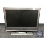 A Sony Bravia 26 LCD TV with remote