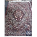 A Tabriz design rug,