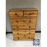 A pine six drawer chest