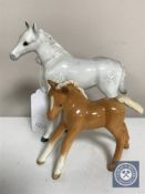 Two Beswick pony figures CONDITION REPORT: 1st with crack to left ear.