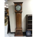 A continental mahogany longcase clock with painted dial,