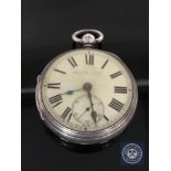 A silver key wound open face pocket watch