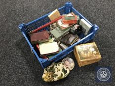 A basket of twentieth century desk calendar, wooden box of keys, cased dominoes, compact,