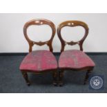A pair of Victorian mahogany balloon backed chairs