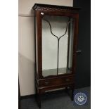 An early 20th century mahogany display cabinet, fitted with a drawer,