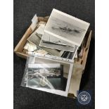A box of photographs and album including street scenes,