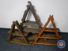 Three oak triangular wall shelves