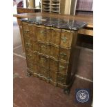 A French walnut marble topped serpentine fronted four drawer chest CONDITION REPORT: