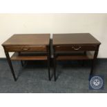 A pair of reproduction mahogany lamp tables fitted drawers