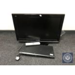 A Panasonic 26" LCD TV together with a Sony DVD player with remotes