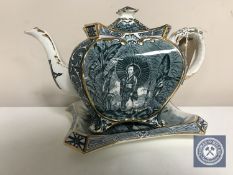 A 19th century English porcelain teapot on stand