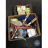 A box of assorted hand tools and accessories,