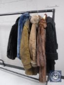 A collection of vintage lady's coats including fur etc.