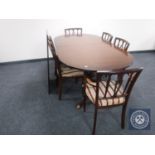 A reproduction mahogany twin pedestal dining table,