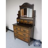 An Edwardian walnut mirrored dressing table