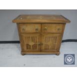 A Barker and Stonehouse flagstone two drawer side cabinet