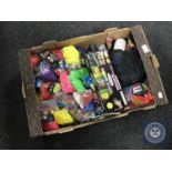 A box of loom bands and a quantity of cap gun re-fills