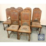 A set of ten late 19th century oak and tooled leather dining chairs.