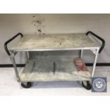 An Inco metal two tier trolley