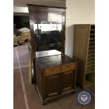 An antique inlaid mahogany marble topped hall cupboard with similar hall mirror