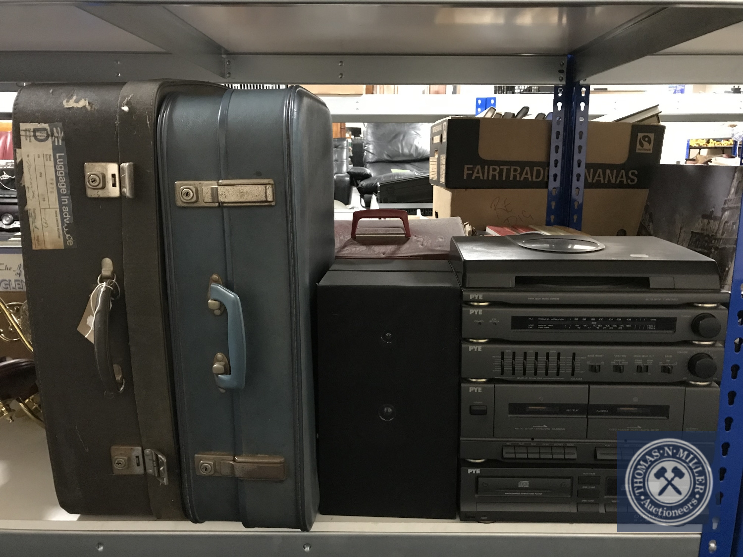 A Pye hifi with speakers together with two mid twentieth century luggage cases