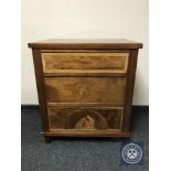 A 19th century continental inlaid mahogany three drawer chest