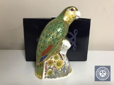 A Royal Crown Derby paperweight, Amazon Green Parrot, with gold stopper, number 1376 of 2500,
