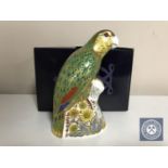 A Royal Crown Derby paperweight, Amazon Green Parrot, with gold stopper, number 1376 of 2500,