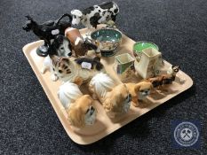 A tray of 19th century cow creamer, together with of assorted china animal figures,