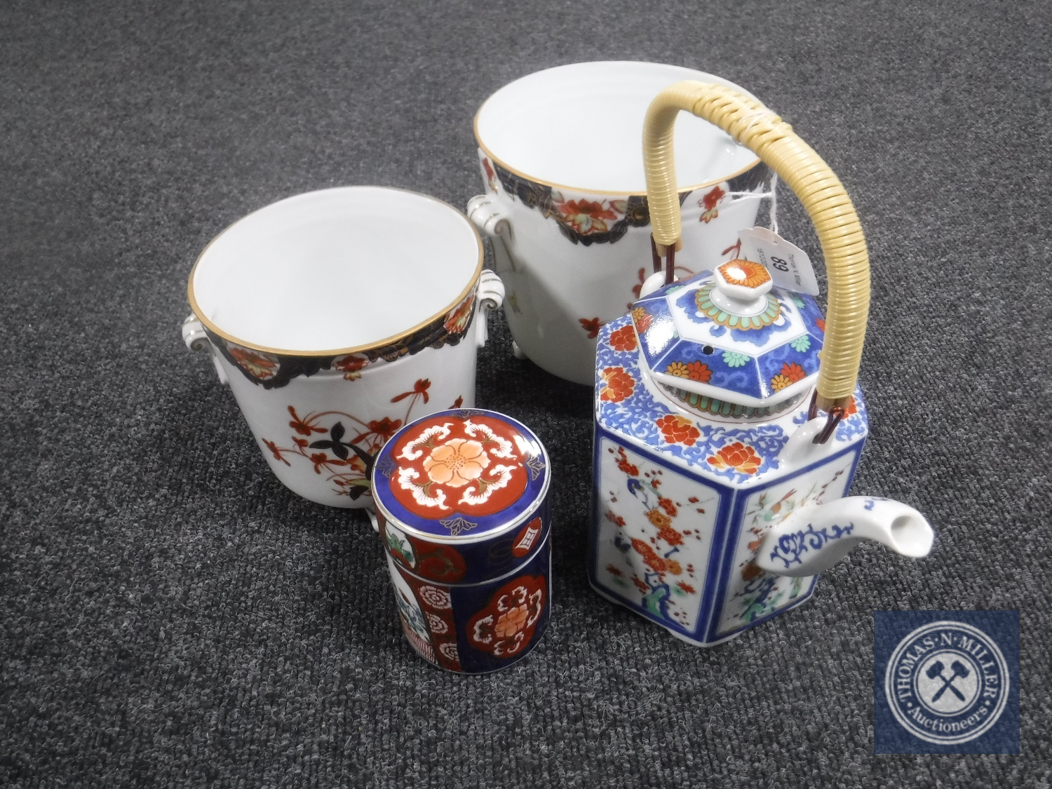 Four pieces of modern Imari porcelain including a teapot