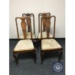 A set of four Queen Anne style dining chairs