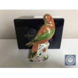 A Royal Crown Derby paperweight, Lorikeet, with gold stopper, number 221 of 2500,