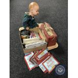 A tray of antique doll, Roberts radio, marbles,