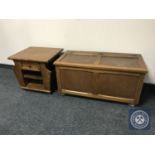 An oak blanket box together with an oak magazine table with a drawer