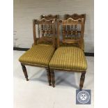 A set of four Edwardian mahogany dining chairs