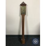 A continental mahogany stick barometer