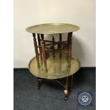 Two folding Eastern brass topped tables