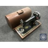 A vintage Singer hand sewing machine