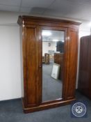 A Victorian mahogany mirrored door compactum wardrobe CONDITION REPORT: Typical