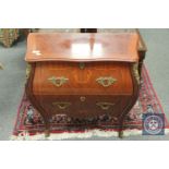 A reproduction ormolu mounted bombe two drawer chest,