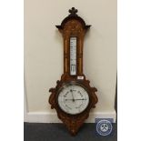 A 19th century inlaid rosewood barometer CONDITION REPORT: Glass cracked.