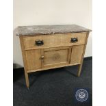 An early 20th century oak marble topped washstand