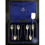 A cased set of six silver teaspoons with tongs, Joseph Rogers & Sons,