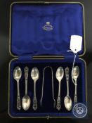 A cased set of six silver teaspoons with tongs, Joseph Rogers & Sons,