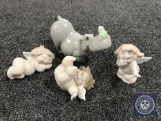 A Nao hippopotamus and three Nao cherubs