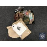 A box of military clothing, ammunition belt, brass button polisher, hand flares,