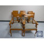 A set of eight continental mahogany dining chairs comprising of two carvers and six singles