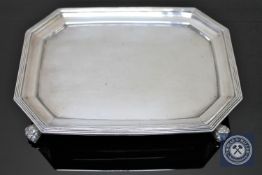 A Georgian silver card tray on paw feet. CONDITION REPORT: Good condition. 344g.